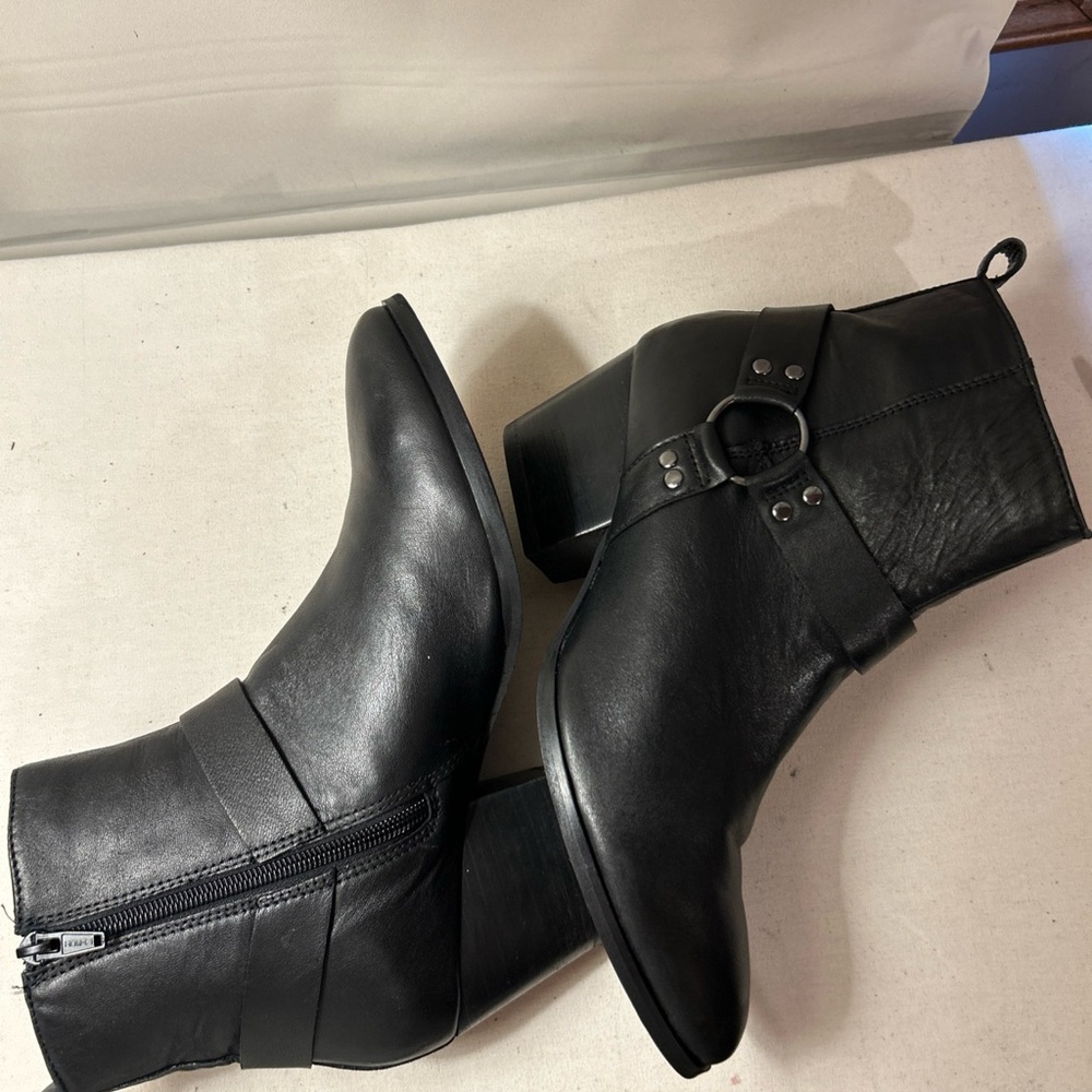 Sleek Black Leather Buckle Boots